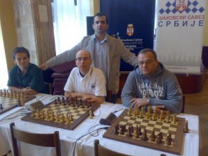 With teammates, GMs Volokitin, Stojanovic and Pikula